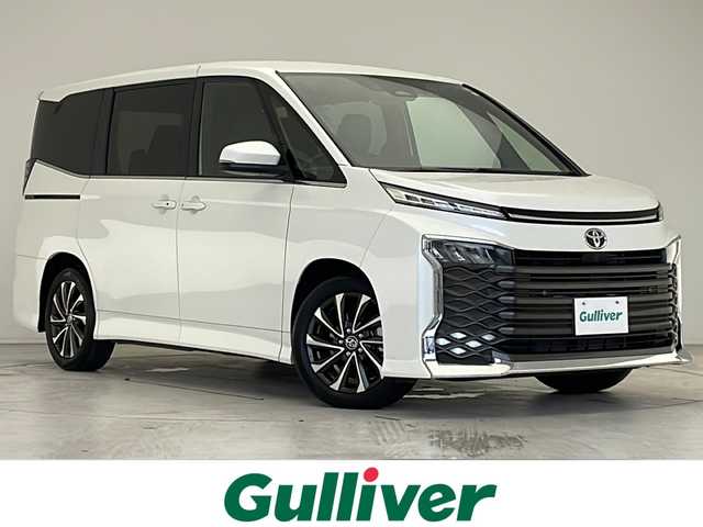 トヨタ ヴォクシー S－Z 愛知県 2023(令5)年 1.5万km ホワイトパールクリスタルシャイン 衝突軽減システム/純正ディスプレイオーディオ（ナビあり）/両側パワースライドドア/レーダークルーズコントロール/シートヒーター/フルセグ/CD/Bluetooth/バックカメラ/コーナーセンサー/純正アルミホイール/ＥＴＣ２．０/LEDヘッドライト/リアオートエアコン/オートマチックハイビーム/ステアリングスイッチ/スマートキー/プッシュスタート