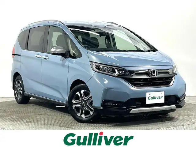 ホンダ フリード クロスター ホンダセンシング 大阪府 2021(令3)年 1.9万km シーグラスブルーパール 社外ナビ(フルセグ/DVD再生/Bluetooth) バックカメラ ETC 両側パワースライドドア ハーフレザー シートヒーター 衝突軽減 レーダークルコン レーンアシスト 前後ドラレコ ワンオーナー