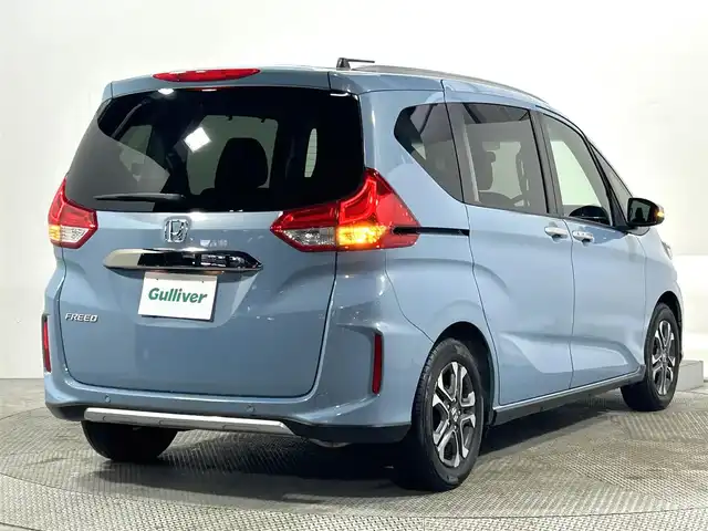 ホンダ フリード クロスター ホンダセンシング 大阪府 2021(令3)年 1.9万km シーグラスブルーパール 社外ナビ(フルセグ/DVD再生/Bluetooth) バックカメラ ETC 両側パワースライドドア ハーフレザー シートヒーター 衝突軽減 レーダークルコン レーンアシスト 前後ドラレコ ワンオーナー