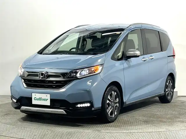 ホンダ フリード クロスター ホンダセンシング 大阪府 2021(令3)年 1.9万km シーグラスブルーパール 社外ナビ(フルセグ/DVD再生/Bluetooth) バックカメラ ETC 両側パワースライドドア ハーフレザー シートヒーター 衝突軽減 レーダークルコン レーンアシスト 前後ドラレコ ワンオーナー