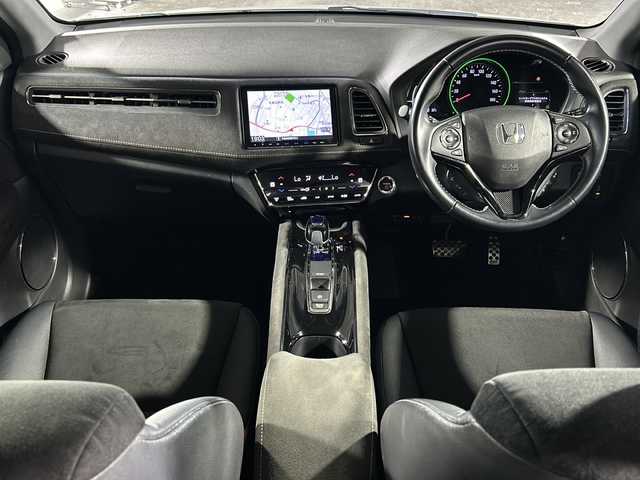 ホンダ ヴェゼル ハイブリッド RS ホンダセンシング 沖縄県 2016(平28)年 9.2万km ホワイトオーキッドパール 禁煙車/純正8インチナビ/【CD/DVD/フルセグTV/BT】/バックカメラ/ETC/ステアリングリモコン/レーダークルーズコントロール/パドルシフト/ハーフレザー/衝突被害軽減ブレーキ/レーンキープアシスト/横滑り防止装置/１８インチ純正アルミ/LEDヘッドライト/オートライト/スマートキー