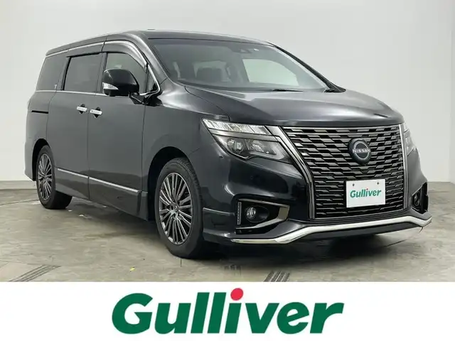日産 エルグランド 250HWS S アーバンクロム 岡山県 2022(令4)年 2.3万km 黒 サンルーフ /純正10インチナビ　MM522D-L/地デジ/BT/CD/DVD/Blu-ray/純正11インチフリップダウンモニター/アラウンドビューモニター/エマージェンシーブレーキ/レーダークルーズコントロール/ハーフレザーシート /BSM/両側パワースライドドア/デジタルインナーミラー/ビルトインETC/純正ドラレコ /電動リアゲート/オットマン/純正フロアマット/レーンアシスト/LEDヘッドライト/オートハイビーム/プッシュスタート /スマートキー/新車保証書