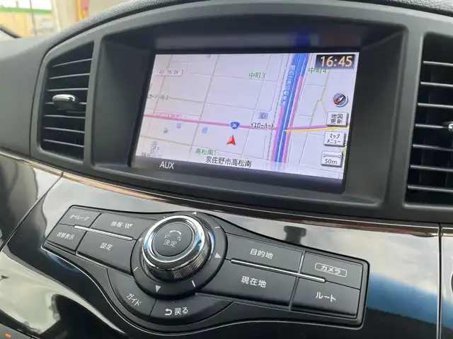 日産 エルグランド 250ハイウェイスター プレミアム 大阪府 2014(平26)年 8.8万km ブリリアントホワイトパール 純正HDDナビ/CD/DVD/フルセグTV/Bluetooth/USB/純正リアエンターテイメントシステム/・後席11インチワイドモニター/・後席リモコン/・ワイヤレスヘッドフォン2個/アラウンドビューモニター/ブラック革シート/パワーシート（前席）/運転席のみメモリー機能付き/シートヒーター（前席）/オットマン/ビルトインETC/両側パワースライドドア/クルーズコントロール/ドライブレコーダー（DRV-340)/AC100V/社外マフラー（柿本）/社外19インチAW/LEDヘッドランプ/フォグランプ/フロントソナー/バックソナー/革巻ステアリング/ステアリングスイッチ/プッシュスタート/スマートキー×２/取扱説明書/保証書