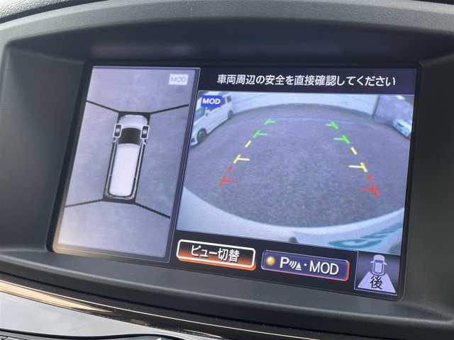 日産 エルグランド 250ハイウェイスター プレミアム 大阪府 2014(平26)年 8.8万km ブリリアントホワイトパール 純正HDDナビ/CD/DVD/フルセグTV/Bluetooth/USB/純正リアエンターテイメントシステム/・後席11インチワイドモニター/・後席リモコン/・ワイヤレスヘッドフォン2個/アラウンドビューモニター/ブラック革シート/パワーシート（前席）/運転席のみメモリー機能付き/シートヒーター（前席）/オットマン/ビルトインETC/両側パワースライドドア/クルーズコントロール/ドライブレコーダー（DRV-340)/AC100V/社外マフラー（柿本）/社外19インチAW/LEDヘッドランプ/フォグランプ/フロントソナー/バックソナー/革巻ステアリング/ステアリングスイッチ/プッシュスタート/スマートキー×２/取扱説明書/保証書