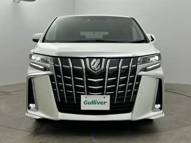 トヨタ アルファード S Cパッケージ 岡山県 2022(令4)年 3.2万km ホワイトパールクリスタルシャイン 純正9インチメモリナビ/（CD/DVD/BT/USB/AppleCarplay/AndroidAuto/フルセグ/テレビキャンセラー）/バックカメラ/純正12.1インチフリップダウンモニター(V12T-R68C)/純正ビルトインETC2.0/100V充電/プリクラッシュセーフティ/クリアランスソナー/レーントレーシングアシスト/リアクロストラフィックアラート/ロードサインアシスト/ブラインドスポットモニター/デジタルインナーミラー/前後ドライブレコーダー/両側パワースライドドア/電動格納ウィンカーミラー/ドアバイザー/ロールサンシェード/LEDヘッドライト/オートマチックハイビーム/フロントフォグランプ/純正18インチアルミホイール/革シート/運転席メモリ付きパワーシート/シートヒーター/シートベンチレーション/パワーバックドア/エンジンスターター