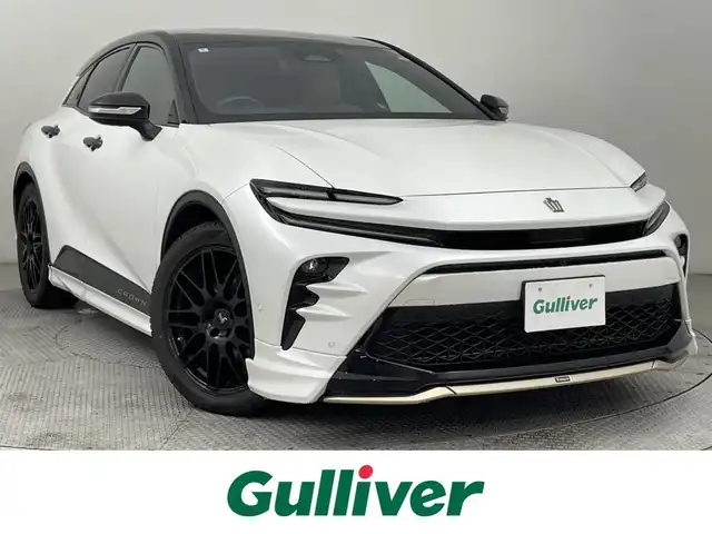 トヨタ クラウン スポーツ Z 道央・札幌 2024(令6)年 1.5万km パールⅡ ・４WD/・寒冷地仕様/・モデリスタエアロ（F/S/R）/・パノラマルーフ/・純正ナビゲーション/　BT/USB/フルセグ/Miracast/・ビルトインETC２．０/・デジタルインナーミラー/・ワイヤレス充電/・パノラミックビューモニター/・トヨタセーフティセンス/　PCS/LDA/BSM/PCS/PDA/RCTA/RCD/　PKSB/SEA/AVSP/RSA/・HUD/・レーダークルーズコントロール/・オートマチックハイビーム/・横滑り防止装置/・前後コーナーセンサー/・レーンキープアシスト/・パワーバックドア/・前席シートヒーター/ベンチレーション/・レザーシート/・オートライト/・LEDヘッドライト/・前席パワーシート（D席メモリー付）/・純正フロアマット/・スマートキー/・プッシュスタート/・保証書付き/・社外AW20インチ冬タイヤ/・純正AW夏タイヤ２１インチ積込