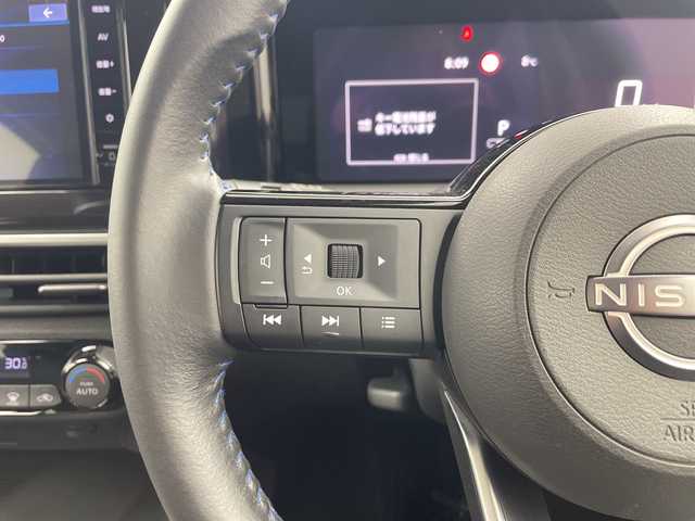 日産 ノート オーテック 三重県 2023(令5)年 2.4万km ピュアホワイトパール / スーパーブラック 2トーン /禁煙車//純正9インチメモリーナビ//エマージェンシーブレーキ//ETC2.0//衝突軽減ブレーキ//レーンキープアシスト//オートハイビーム//バックカメラ//純正前後ドライブレコーダー//ステアリングスイッチ//オーテック専用シグネイチャーLED//オーテック専用ブルー×ブラックコンビレザレットシート/　「AUTECH」刺繍（ブルーステッチ）//オーテック専用16インチAW//LED//オートライト//フォグ//サイドカーテンエアバッグ