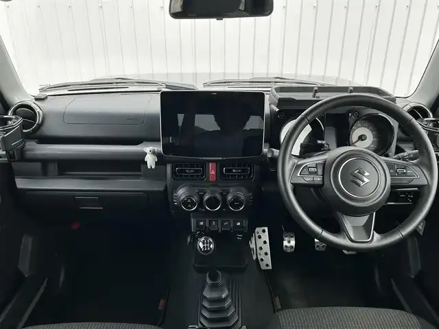 スズキ ジムニー シエラ JC 群馬県 2023(令5)年 2万km ミディアムグレー ワンオーナー/5MT/ALPINE フローティングナビ/(FM/AM/Bluetooth/HDMI/Apple Car Play/Android Auto)/スズキセーフティサポート/・デュアルブレーキサポート/・先行車発進お知らせ機能/・標識認証機能/・車線逸脱警報機能/クルーズコントロール/ドライブレコーダー/ビルトインETC/前席シートヒーター/LEDヘッドライト/フォグランプ/電動格納ミラー/ヘッドライトウォッシャー/アイドリングストップ/オートライト/ステアリングスイッチ/純正アルミホイール/社外フロアマット/保証書/取扱説明書/記録簿