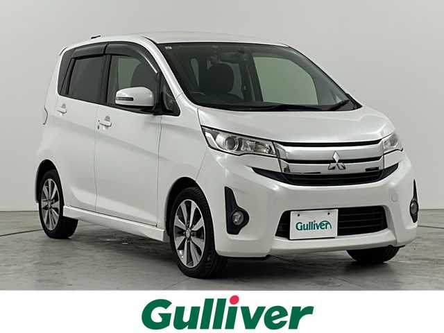 三菱 ｅＫカスタム T 道央・札幌 2013(平25)年 5.9万km シルキーホワイト ・４WD　/ターボ/・社外カロッツェリアナビ/・DVD.CD.SD.Bluetooth/・MSV.フルセグ/・バックカメラ/・ドライブレコーダー/・シートヒーター/・HIDライト/オートライト/・純正エンジンスターター/・スマートキー/スペアキー