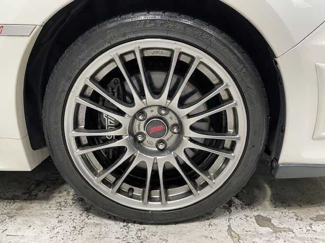 スバル インプレッサ ＷＲＸ 宮城県 2011(平23)年 6.8万km サテンホワイトパール 6MT/4WD/ターボ/レカロシート（半革）/エグザスエボチューンマフラー/純正ナビ/フルセグTV/Bluetooth/アンチロック・ブレーキ・システム/キセノンライト/オートライト/プッシュスタート/スマートキー/純正エアロパーツ/純正アルミホイール/純正ETC/横滑り防止装置/純正フロアマット