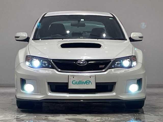 スバル インプレッサ ＷＲＸ 宮城県 2011(平23)年 6.8万km サテンホワイトパール 6MT/4WD/ターボ/レカロシート（半革）/エグザスエボチューンマフラー/純正ナビ/フルセグTV/Bluetooth/アンチロック・ブレーキ・システム/キセノンライト/オートライト/プッシュスタート/スマートキー/純正エアロパーツ/純正アルミホイール/純正ETC/横滑り防止装置/純正フロアマット