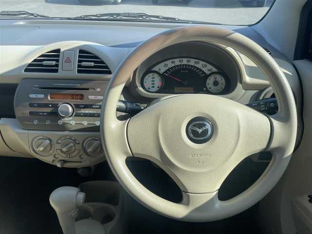 マツダ キャロル GS 宮崎県 2013(平25)年 5.1万km ミルクティーベージュ 純正オーディオ/　AM FM CD/ヘッドライトレベライザー/パワーウィンドウ