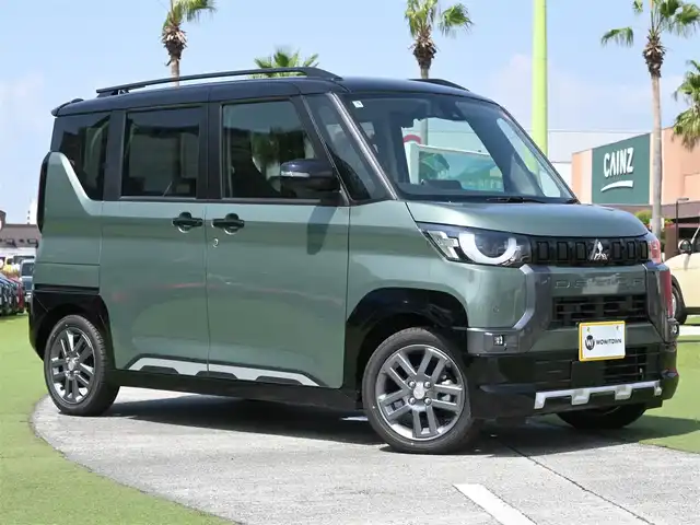 三菱 デリカミニ T プレミアム 千葉県 2025(令7)年 0.1千km 緑Ⅱ T　PREMIUM　9型ディスプレイオーディオ（121/330）　サイドデカール（33440）/e-Assist/・衝突被害軽減ブレーキシステム（FCM）/・誤発進抑制機能（前進＆後退時）（UMS）/・車線逸脱警報システム（LDW）/・レーダークルーズコントロールシステム（ACC）/・オートマチックハイビーム[AHB]/マイパイロット/ハンズフリー両側パワースライドドア/ディスプレイオーディオ/【Bluetooth接続】/【Apple CarPlay　Android Auto対応】/マルチアラウンドモニター/ハーフレザーシート/前席シートヒーター/デジタルインナーミラー/革巻きステアリング/ステアリングヒーター/ステアリングスイッチ/LEDヘッドライト/フォグライト/ウインカーミラー/コーナーセンサー/純正15インチアルミホイル/サイド/カーテンエアバッグ/キーレスオペレーションシステム