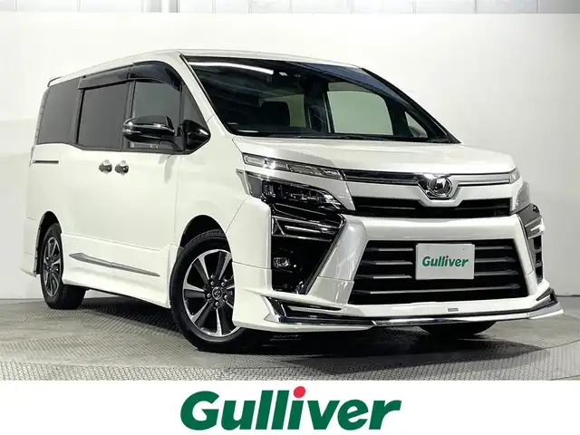 トヨタ ヴォクシー ZS 煌 大阪府 2018(平30)年 6.9万km ホワイトパールクリスタルシャイン モデリスタエアロ 純正10incナビTV Bカメラ ETC 両側パワースライドドア 衝突軽減 クルコン トヨタセーフティセンス リアオートエアコン スマートキー Pスタート