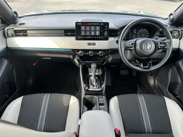 ホンダ ヴェゼル ハイブリッド e:HEV Z PLaYパッケージ 鹿児島県 2024(令6)年 2万km ブルーグリーン ワンオーナー/ガラスルーフ/純正メモリナビ/　　BT/フルセグ/アラウンドビューモニター/レーダークルーズコントロール/LEDヘッドライト/ハーフレザーシート/純正18インチAW/スマートキー/純正ビルトインETC2.0/ステアリングヒーター