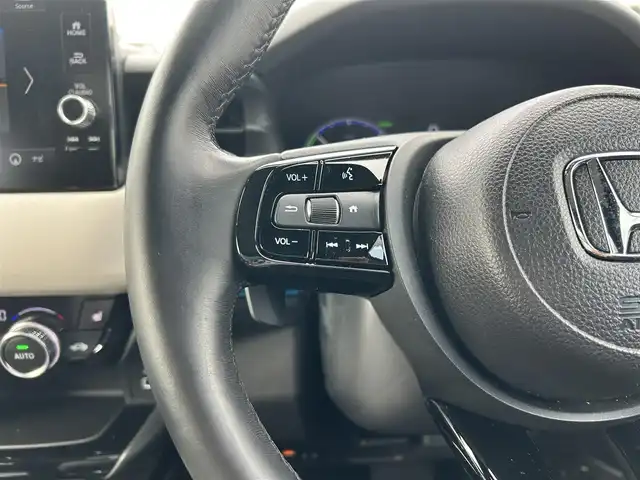 ホンダ ヴェゼル ハイブリッド e:HEV Z PLaYパッケージ 鹿児島県 2024(令6)年 2万km ブルーグリーン ワンオーナー/ガラスルーフ/純正メモリナビ/　　BT/フルセグ/アラウンドビューモニター/レーダークルーズコントロール/LEDヘッドライト/ハーフレザーシート/純正18インチAW/スマートキー/純正ビルトインETC2.0/ステアリングヒーター