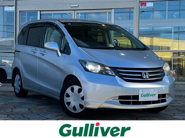 ホンダ フリード G ジャストセレクション 静岡県 2009(平21)年 5.2万km アラバスターシルバーメタリック 社外ナビ（AM FM CD ワンセグテレビ iPod）/片側パワースライドドア/チップアップシート/3列シート/ETC/純正フロアマット/キノセンヘッドライト/オートライト/リモコンキー/スペアキー×１/パワーステアリング/パワーウィンドウ/オートエアコン/ABS/取扱説明書/保証書
