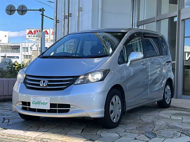 ホンダ フリード G ジャストセレクション 静岡県 2009(平21)年 5.2万km アラバスターシルバーメタリック 社外ナビ（AM FM CD ワンセグテレビ iPod）/片側パワースライドドア/チップアップシート/3列シート/ETC/純正フロアマット/キノセンヘッドライト/オートライト/リモコンキー/スペアキー×１/パワーステアリング/パワーウィンドウ/オートエアコン/ABS/取扱説明書/保証書