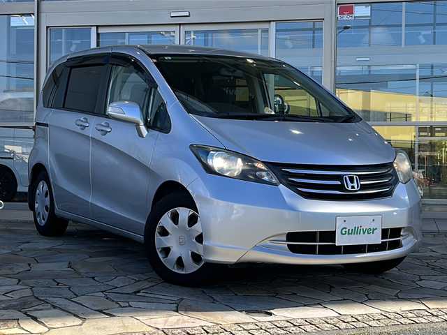 ホンダ フリード G ジャストセレクション 静岡県 2009(平21)年 5.2万km アラバスターシルバーメタリック 社外ナビ（AM FM CD ワンセグテレビ iPod）/片側パワースライドドア/チップアップシート/3列シート/ETC/純正フロアマット/キノセンヘッドライト/オートライト/リモコンキー/スペアキー×１/パワーステアリング/パワーウィンドウ/オートエアコン/ABS/取扱説明書/保証書