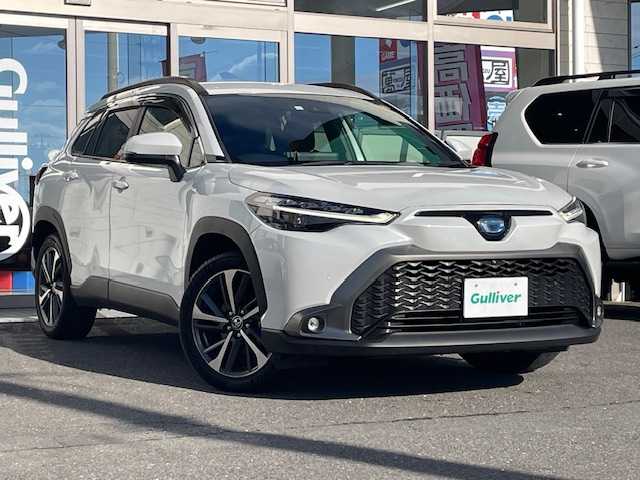 トヨタ カローラ クロス ハイブリッド Z 青森県 2023(令5)年 3.2万km プラチナホワイトパールマイカ ワンオーナー/純正ナビ（BlueTooth/フルセグ/DVD）/トヨタセーフティセンス/全周囲カメラ/バックカメラ/ハンドルヒーター/AC100V/純正エンジンスターター/ハーフレザーシート/D/N席シートヒーター/VIEWカメラ/オートライト/フォグランプ/寒冷地仕様/ハンズフリーパワーバックドア/純正225/50/18インチAW（夏装着）/社外215/60/17インチAW（冬VRX3）/保証書/取扱説明書