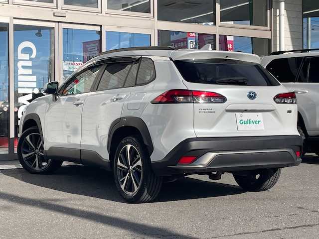 トヨタ カローラ クロス ハイブリッド Z 青森県 2023(令5)年 3.2万km プラチナホワイトパールマイカ ワンオーナー/純正ナビ（BlueTooth/フルセグ/DVD）/トヨタセーフティセンス/全周囲カメラ/バックカメラ/ハンドルヒーター/AC100V/純正エンジンスターター/ハーフレザーシート/D/N席シートヒーター/VIEWカメラ/オートライト/フォグランプ/寒冷地仕様/ハンズフリーパワーバックドア/純正225/50/18インチAW（夏装着）/社外215/60/17インチAW（冬VRX3）/保証書/取扱説明書