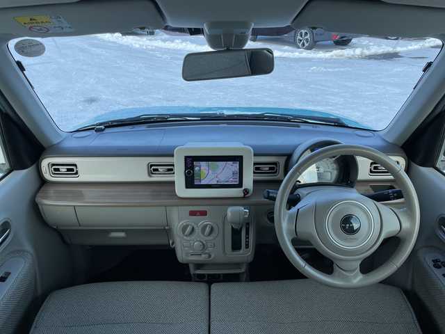 スズキ ラパン S 道央・札幌 2015(平27)年 13.5万km フレンチミントパールメタリック ４WD/社外メモリーナビ/AM/FM/CD/AUX/衝突被害軽減ブレーキ/横滑り防止装置/バックカメラ/ETC/アイドリングストップ/前席シートヒーター/革巻きステアリング/プッシュスタート/スマートキー/キセノンヘッドライト/オートライト/電動格納ミラー/ヒーテッドドアミラー/社外フロアマット/ドアバイザー/社外AW付夏タイヤ積込/155/65/R14/2025年/山6mm