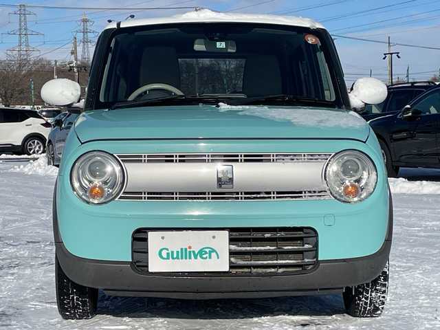 スズキ ラパン S 道央・札幌 2015(平27)年 13.5万km フレンチミントパールメタリック ４WD/社外メモリーナビ/AM/FM/CD/AUX/衝突被害軽減ブレーキ/横滑り防止装置/バックカメラ/ETC/アイドリングストップ/前席シートヒーター/革巻きステアリング/プッシュスタート/スマートキー/キセノンヘッドライト/オートライト/電動格納ミラー/ヒーテッドドアミラー/社外フロアマット/ドアバイザー/社外AW付夏タイヤ積込/155/65/R14/2025年/山6mm