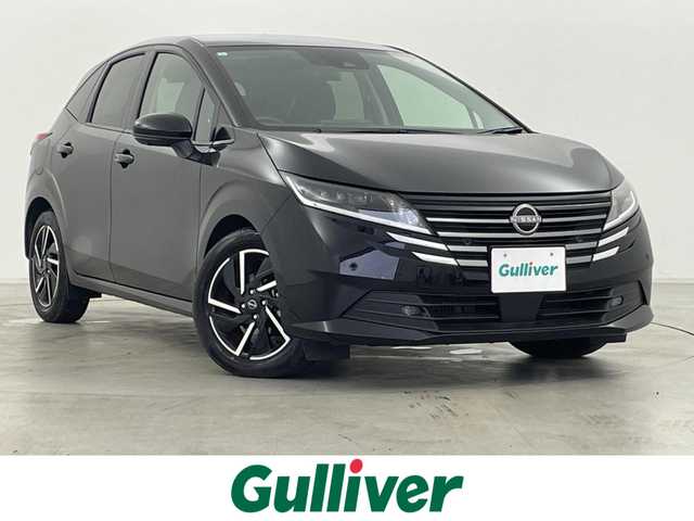 日産 ノート X 群馬県 2024(令6)年 0.4万km スーパーブラック アダプティブLEDヘッドライトシステム/LEDフォグランプ/16インチアルミホイール/インテリジェント アラウンドビューモニター/インテリジェント ルームミラー /ステアリングスイッチ/USB電源ソケット(タイプA 1個、タイプC 1個) /ワイヤレス充電器/NissanConnectナビゲーションシステム(地デジ内蔵)/ETC2.0ユニット(ビルトインタイプ)/プロパイロット(ナビリンク機能付)/プロパイロット緊急停止支援システム(SOSコール機能付)/インテリジェント BSI(後側方衝突防止支援システム)/BSW(後側方車両検知警報)/RCTA(後退時車両検知警報)/=================/純正9インチナビ/AM/FM/BT/USB/HDMI/AppleCarPlay/AndroidAuto/フルセグ/インテリジェントエマージェンシーブレーキ/踏み間違い衝突防止アシスト/標識検知機能/インテリジェントFCW(前方衝突予測警報)/LDW(車線逸脱警報)/インテリジェントDA(ふらつき警報)/インテリジェントLI (車線逸脱防止支援システム)/フロント&バックソナー/スマートキー/プッシュスタート