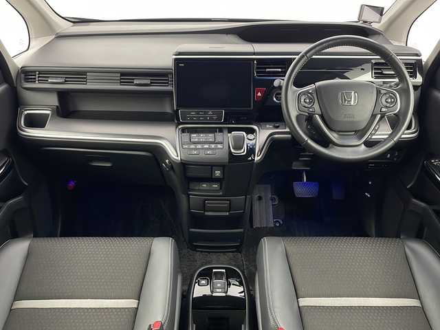 ホンダ ステップワゴン スパーダ eHEV G EXホンダS 新潟県 2020(令2)年 5.9万km プレミアムスパークルブラックパール 純正ディーラーOPナビ（型式：VXU-187SWi）/・CD/DVD/Bluetooth/USB/iPod/全周囲モニター/ホンダセンシング/衝突被害軽減システム/アダプティブクルーズコントロ―ル/レーンキープアシスト/ETC2.0/純正ドライブレコーダー/レーダー探知機/両側パワースライドドア/3列シート/ハーフレザーシート/前席シートヒーター/純正フロアマット/純正LEDヘッドライト/オートライト/純正16インチAW冬タイヤ/ABS/横滑り防止機能/盗難防止装置