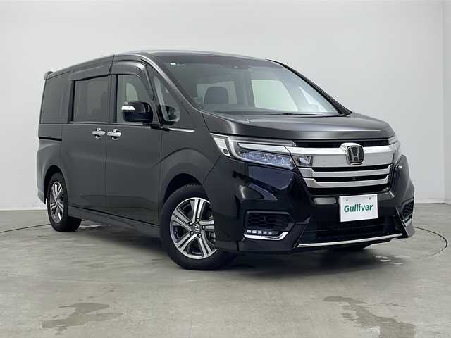 ホンダ ステップワゴン スパーダ eHEV G EXホンダS 新潟県 2020(令2)年 5.9万km プレミアムスパークルブラックパール 純正ディーラーOPナビ（型式：VXU-187SWi）/・CD/DVD/Bluetooth/USB/iPod/全周囲モニター/ホンダセンシング/衝突被害軽減システム/アダプティブクルーズコントロ―ル/レーンキープアシスト/ETC2.0/純正ドライブレコーダー/レーダー探知機/両側パワースライドドア/3列シート/ハーフレザーシート/前席シートヒーター/純正フロアマット/純正LEDヘッドライト/オートライト/純正16インチAW冬タイヤ/ABS/横滑り防止機能/盗難防止装置