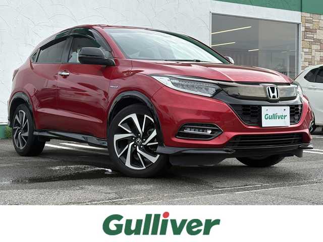ホンダ ヴェゼル ハイブリッド RS ホンダセンシング 徳島県 2019(平31)年 3.5万km プレミアムクリスタルレッドM Gathers 8型SDナビ　VXM-195VFi/　DISC/フルセグ/AM/FM/BT/USB/バックカメラ/ビルトインETC/追従式クルーズコントロール/パドルシフト/ハーフレザーシート/シートヒーター/オートブレーキホールド/ドアバイザー/SPORT MODE/スペアキー/スマートキー/プッシュスタート/フォグライト/リヤフォッガー/オートライト/LEDヘッドライト/純正フロアマット/ホンダセンシング/取扱説明書/新車時保証書