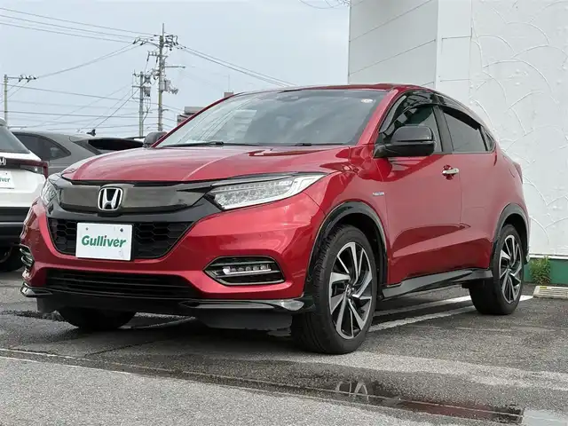 ホンダ ヴェゼル ハイブリッド RS ホンダセンシング 徳島県 2019(平31)年 3.5万km プレミアムクリスタルレッドM Gathers 8型SDナビ　VXM-195VFi/　DISC/フルセグ/AM/FM/BT/USB/バックカメラ/ビルトインETC/追従式クルーズコントロール/パドルシフト/ハーフレザーシート/シートヒーター/オートブレーキホールド/ドアバイザー/SPORT MODE/スペアキー/スマートキー/プッシュスタート/フォグライト/リヤフォッガー/オートライト/LEDヘッドライト/純正フロアマット/ホンダセンシング/取扱説明書/新車時保証書