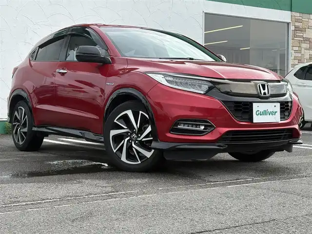 ホンダ ヴェゼル ハイブリッド RS ホンダセンシング 徳島県 2019(平31)年 3.5万km プレミアムクリスタルレッドM Gathers 8型SDナビ　VXM-195VFi/　DISC/フルセグ/AM/FM/BT/USB/バックカメラ/ビルトインETC/追従式クルーズコントロール/パドルシフト/ハーフレザーシート/シートヒーター/オートブレーキホールド/ドアバイザー/SPORT MODE/スペアキー/スマートキー/プッシュスタート/フォグライト/リヤフォッガー/オートライト/LEDヘッドライト/純正フロアマット/ホンダセンシング/取扱説明書/新車時保証書