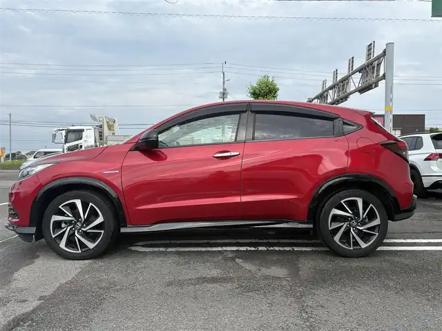 ホンダ ヴェゼル ハイブリッド RS ホンダセンシング 徳島県 2019(平31)年 3.5万km プレミアムクリスタルレッドM Gathers 8型SDナビ　VXM-195VFi/　DISC/フルセグ/AM/FM/BT/USB/バックカメラ/ビルトインETC/追従式クルーズコントロール/パドルシフト/ハーフレザーシート/シートヒーター/オートブレーキホールド/ドアバイザー/SPORT MODE/スペアキー/スマートキー/プッシュスタート/フォグライト/リヤフォッガー/オートライト/LEDヘッドライト/純正フロアマット/ホンダセンシング/取扱説明書/新車時保証書