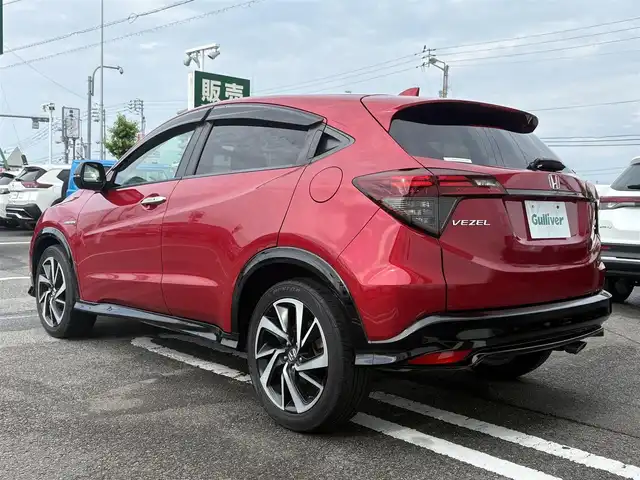 ホンダ ヴェゼル ハイブリッド RS ホンダセンシング 徳島県 2019(平31)年 3.5万km プレミアムクリスタルレッドM Gathers 8型SDナビ　VXM-195VFi/　DISC/フルセグ/AM/FM/BT/USB/バックカメラ/ビルトインETC/追従式クルーズコントロール/パドルシフト/ハーフレザーシート/シートヒーター/オートブレーキホールド/ドアバイザー/SPORT MODE/スペアキー/スマートキー/プッシュスタート/フォグライト/リヤフォッガー/オートライト/LEDヘッドライト/純正フロアマット/ホンダセンシング/取扱説明書/新車時保証書