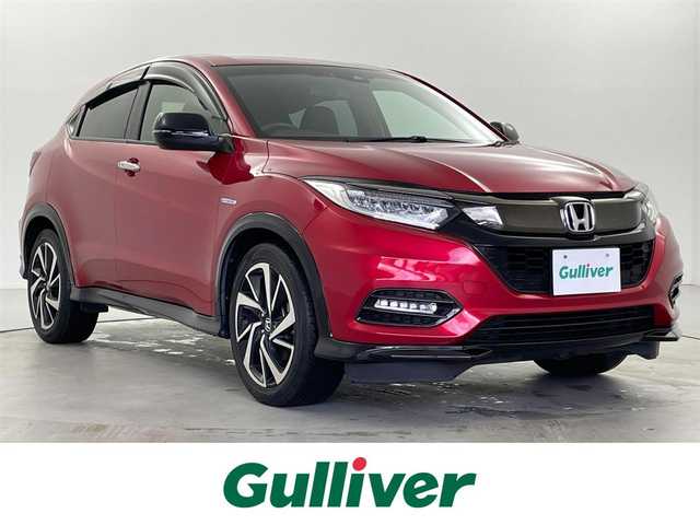 ホンダ ヴェゼル ハイブリッド RS ホンダセンシング 福井県 2019(平31)年 3.5万km プレミアムクリスタルレッドM Gathers 8型SDナビ/型式：VXM-195VFi/FM/AM/フルセグ/Bluetooth/USB】/バックカメラ/ビルトインETC/追従式クルーズコントロール/パドルシフト/ハーフレザーシート/シートヒーター/オートブレーキホールド/ドアバイザー/SPORT MODE/スペアキー/スマートキー/プッシュスタート/フォグライト/リヤフォッガー/オートライト/LEDヘッドライト/純正フロアマット/ホンダセンシング/取扱説明書/新車時保証書