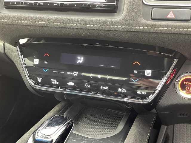 ホンダ ヴェゼル ハイブリッド RS ホンダセンシング 福井県 2019(平31)年 3.5万km プレミアムクリスタルレッドM Gathers 8型SDナビ/型式：VXM-195VFi/FM/AM/フルセグ/Bluetooth/USB】/バックカメラ/ビルトインETC/追従式クルーズコントロール/パドルシフト/ハーフレザーシート/シートヒーター/オートブレーキホールド/ドアバイザー/SPORT MODE/スペアキー/スマートキー/プッシュスタート/フォグライト/リヤフォッガー/オートライト/LEDヘッドライト/純正フロアマット/ホンダセンシング/取扱説明書/新車時保証書