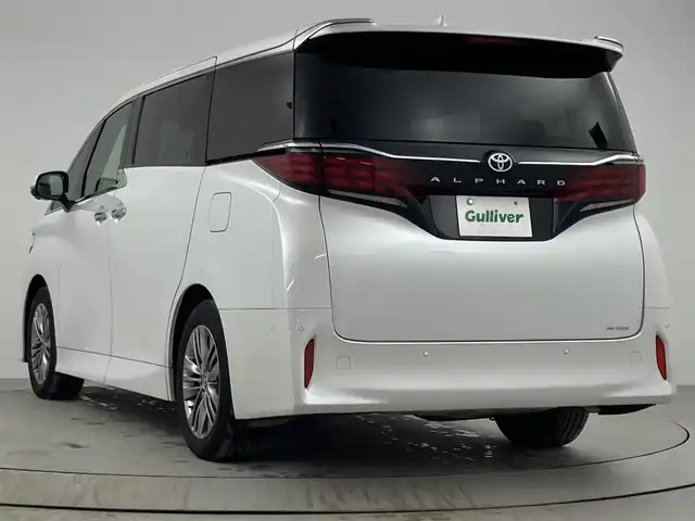 トヨタ アルファード Z 熊本県 2023(令5)年 2.5万km プラチナホワイトパールマイカ ワンオーナー/左右独立ムーンルーフ　/後席モニター　/純正１４型ＤＡナビ　/全方位カメラ　/セーフティセンス　/ＰＫＳＢ　/ＢＳＭ　/パーキングアシスト　/両側電動スライドドア　/パワーバックドア　/３眼ＬＥＤヘッドライト　/デジタルルームミラー/ビルトインETC２．０/シートベンチレーション／ヒーター/ステアリングヒーター/ワイヤレス充電