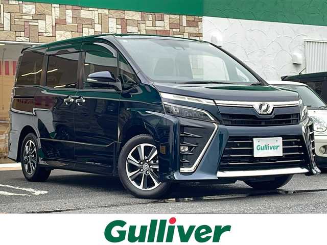 トヨタ ヴォクシー ZS 煌Ⅱ 徳島県 2019(令1)年 3.6万km ブラッキッシュアゲハガラスフレーク 純正9型SDナビ　NSZT-Y68T/（BT/ラジオ/DISC/SD）/フリップダウンモニター/バックカメラ/純正16インチアルミホイール/ワンオーナー/前後コーナーセンサー/アイドリングストップ/クルーズコントロール/両側電動スライドドア/ドライブレコーダー/ETC/ステアリングリモコン/LEDヘッドライト/純正ドアバイザー/オートライト/セーフティセンス