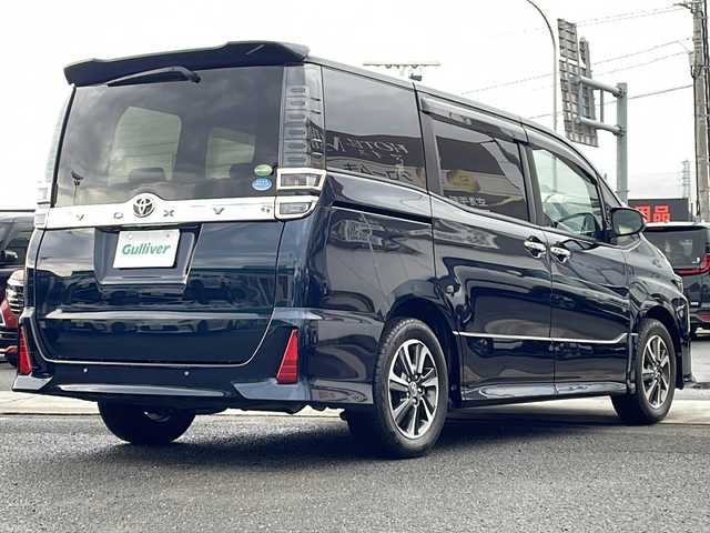 トヨタ ヴォクシー ZS 煌Ⅱ 徳島県 2019(令1)年 3.6万km ブラッキッシュアゲハガラスフレーク 純正9型SDナビ　NSZT-Y68T/（BT/ラジオ/DISC/SD）/フリップダウンモニター/バックカメラ/純正16インチアルミホイール/ワンオーナー/前後コーナーセンサー/アイドリングストップ/クルーズコントロール/両側電動スライドドア/ドライブレコーダー/ETC/ステアリングリモコン/LEDヘッドライト/純正ドアバイザー/オートライト/セーフティセンス