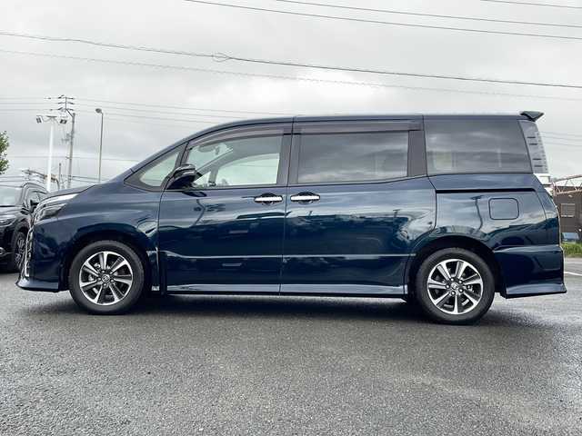 トヨタ ヴォクシー ZS 煌Ⅱ 徳島県 2019(令1)年 3.6万km ブラッキッシュアゲハガラスフレーク 純正9型SDナビ　NSZT-Y68T/（BT/ラジオ/DISC/SD）/フリップダウンモニター/バックカメラ/純正16インチアルミホイール/ワンオーナー/前後コーナーセンサー/アイドリングストップ/クルーズコントロール/両側電動スライドドア/ドライブレコーダー/ETC/ステアリングリモコン/LEDヘッドライト/純正ドアバイザー/オートライト/セーフティセンス
