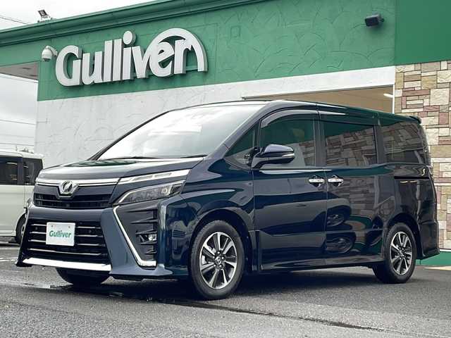 トヨタ ヴォクシー ZS 煌Ⅱ 徳島県 2019(令1)年 3.6万km ブラッキッシュアゲハガラスフレーク 純正9型SDナビ　NSZT-Y68T/（BT/ラジオ/DISC/SD）/フリップダウンモニター/バックカメラ/純正16インチアルミホイール/ワンオーナー/前後コーナーセンサー/アイドリングストップ/クルーズコントロール/両側電動スライドドア/ドライブレコーダー/ETC/ステアリングリモコン/LEDヘッドライト/純正ドアバイザー/オートライト/セーフティセンス