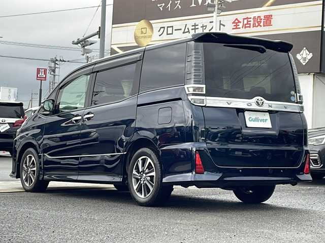 トヨタ ヴォクシー ZS 煌Ⅱ 徳島県 2019(令1)年 3.6万km ブラッキッシュアゲハガラスフレーク 純正9型SDナビ　NSZT-Y68T/（BT/ラジオ/DISC/SD）/フリップダウンモニター/バックカメラ/純正16インチアルミホイール/ワンオーナー/前後コーナーセンサー/アイドリングストップ/クルーズコントロール/両側電動スライドドア/ドライブレコーダー/ETC/ステアリングリモコン/LEDヘッドライト/純正ドアバイザー/オートライト/セーフティセンス