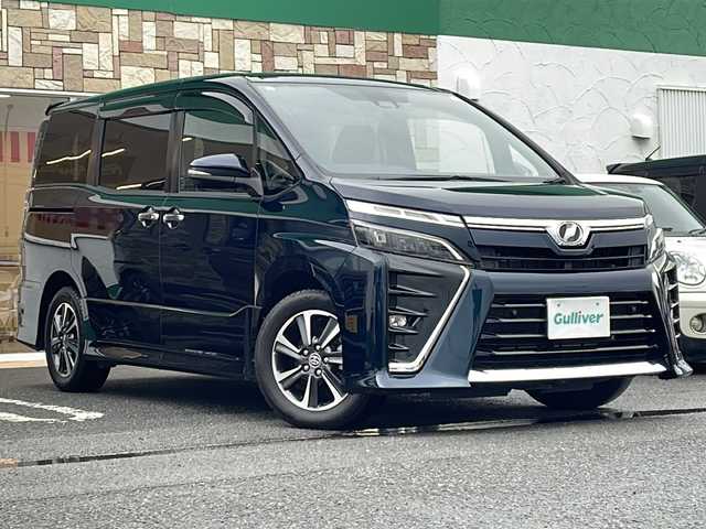 トヨタ ヴォクシー ZS 煌Ⅱ 徳島県 2019(令1)年 3.6万km ブラッキッシュアゲハガラスフレーク 純正9型SDナビ　NSZT-Y68T/（BT/ラジオ/DISC/SD）/フリップダウンモニター/バックカメラ/純正16インチアルミホイール/ワンオーナー/前後コーナーセンサー/アイドリングストップ/クルーズコントロール/両側電動スライドドア/ドライブレコーダー/ETC/ステアリングリモコン/LEDヘッドライト/純正ドアバイザー/オートライト/セーフティセンス