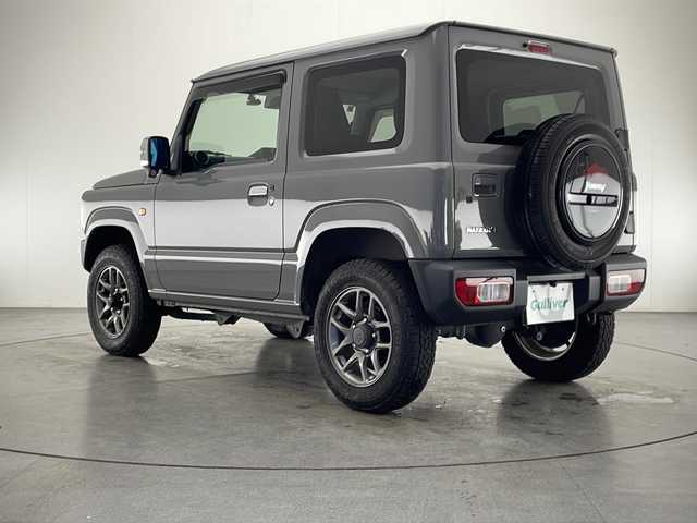 スズキ ジムニー XC 宮崎県 2019(平31)年 2.2万km ミディアムグレー 禁煙車/衝突被害軽減ブレーキ/社外ナビTV/（DPV-7000/CD/DVD/Bluetooth/FMAM/フルセグTV)/社外バックカメラ/社外ETC/純正ドライブレコーダー/純正LEDオートライト/純正LEDフォグ(IPF）/純正16インチアルミ/純正革調シートカバー/純正メッキドアミラーカバー/純正メッキフォグベゼル/純正フロアマット/クルーズコントロール/レーンディパーチャーアラート/ダウンヒルアシストコントロール/前席シートヒーター/ヒーテッドドアミラー/本革巻ハンドル/オートエアコン/スマートキー/プッシュエンジンスタート/新車時保証書/取扱い説明書