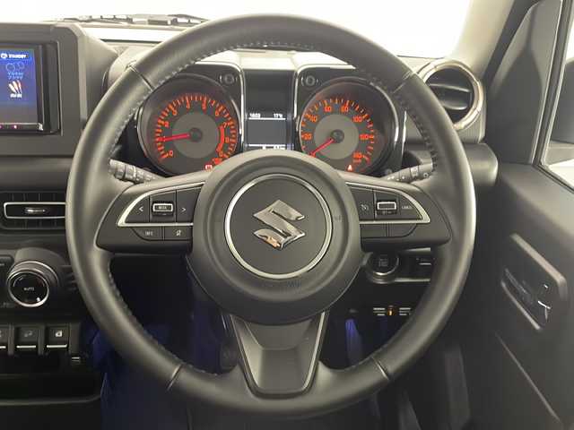 スズキ ジムニー XC 宮崎県 2019(平31)年 2.2万km ミディアムグレー 禁煙車/衝突被害軽減ブレーキ/社外ナビTV/（DPV-7000/CD/DVD/Bluetooth/FMAM/フルセグTV)/社外バックカメラ/社外ETC/純正ドライブレコーダー/純正LEDオートライト/純正LEDフォグ(IPF）/純正16インチアルミ/純正革調シートカバー/純正メッキドアミラーカバー/純正メッキフォグベゼル/純正フロアマット/クルーズコントロール/レーンディパーチャーアラート/ダウンヒルアシストコントロール/前席シートヒーター/ヒーテッドドアミラー/本革巻ハンドル/オートエアコン/スマートキー/プッシュエンジンスタート/新車時保証書/取扱い説明書