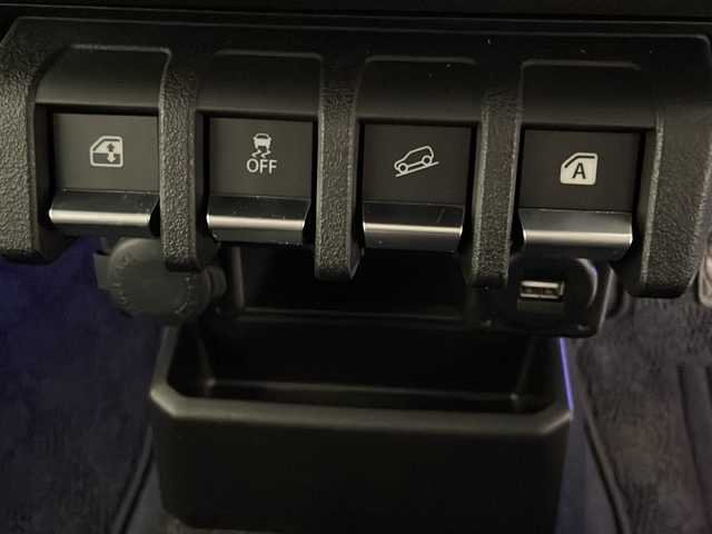 スズキ ジムニー XC 宮崎県 2019(平31)年 2.2万km ミディアムグレー 禁煙車/衝突被害軽減ブレーキ/社外ナビTV/（DPV-7000/CD/DVD/Bluetooth/FMAM/フルセグTV)/社外バックカメラ/社外ETC/純正ドライブレコーダー/純正LEDオートライト/純正LEDフォグ(IPF）/純正16インチアルミ/純正革調シートカバー/純正メッキドアミラーカバー/純正メッキフォグベゼル/純正フロアマット/クルーズコントロール/レーンディパーチャーアラート/ダウンヒルアシストコントロール/前席シートヒーター/ヒーテッドドアミラー/本革巻ハンドル/オートエアコン/スマートキー/プッシュエンジンスタート/新車時保証書/取扱い説明書