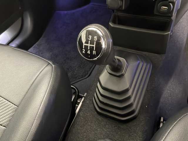 スズキ ジムニー XC 宮崎県 2019(平31)年 2.2万km ミディアムグレー 禁煙車/衝突被害軽減ブレーキ/社外ナビTV/（DPV-7000/CD/DVD/Bluetooth/FMAM/フルセグTV)/社外バックカメラ/社外ETC/純正ドライブレコーダー/純正LEDオートライト/純正LEDフォグ(IPF）/純正16インチアルミ/純正革調シートカバー/純正メッキドアミラーカバー/純正メッキフォグベゼル/純正フロアマット/クルーズコントロール/レーンディパーチャーアラート/ダウンヒルアシストコントロール/前席シートヒーター/ヒーテッドドアミラー/本革巻ハンドル/オートエアコン/スマートキー/プッシュエンジンスタート/新車時保証書/取扱い説明書