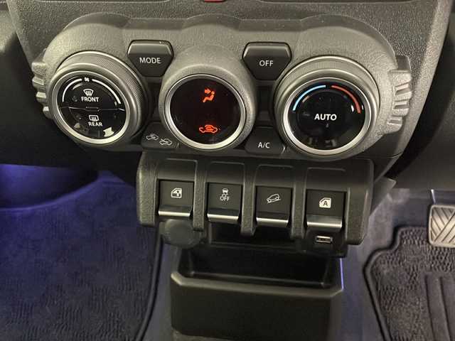 スズキ ジムニー XC 宮崎県 2019(平31)年 2.2万km ミディアムグレー 禁煙車/衝突被害軽減ブレーキ/社外ナビTV/（DPV-7000/CD/DVD/Bluetooth/FMAM/フルセグTV)/社外バックカメラ/社外ETC/純正ドライブレコーダー/純正LEDオートライト/純正LEDフォグ(IPF）/純正16インチアルミ/純正革調シートカバー/純正メッキドアミラーカバー/純正メッキフォグベゼル/純正フロアマット/クルーズコントロール/レーンディパーチャーアラート/ダウンヒルアシストコントロール/前席シートヒーター/ヒーテッドドアミラー/本革巻ハンドル/オートエアコン/スマートキー/プッシュエンジンスタート/新車時保証書/取扱い説明書