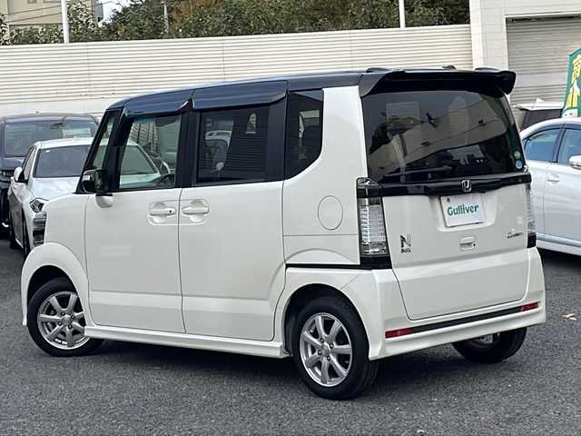 ホンダ Ｎ ＢＯＸ カスタム G SSパッケージ 東京都 2014(平26)年 8.5万km プレミアムホワイトパール 新車時保証書　	/取扱説明書　/シティーブレーキ/社外ナビ/フルセグTV【AVIC-MRZ099】	/SD/CD/DVD/SDREC/BT	/バックカメラ　ETC	/両側パワースライドドア	/HIDライト/Egプッシュスタート/ ストップボタン	/スマートキー	/社外１４インチアルミ
